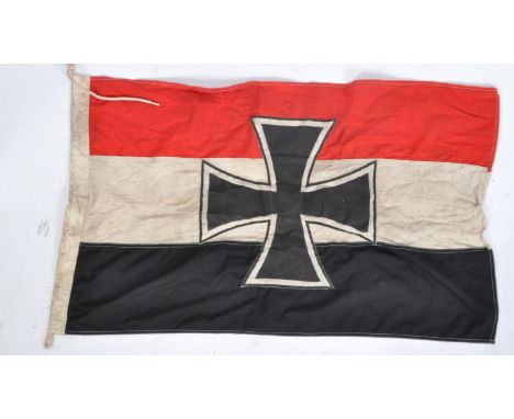 A WWI First World War type Imperial German Navy / Kriegsmarine flag. The flag in red, black and white, with central cross. Ex