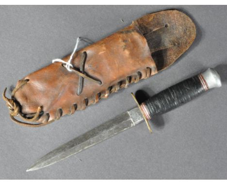 A WWII Second World War period (possibly earlier) double edged combat dagger / fighting knife. Maker not noted, with tapering