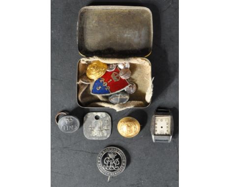 A collection of assorted WWII Second World War and related items to include; GPO uniform button, a token, an enamel blue and 