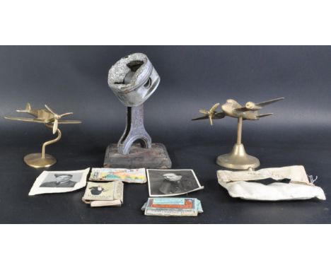 A collection of WWII Second World War interest RAF Royal Air Force related items to include; desktop brass model of a twin-en