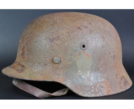 An original WWII Second World War Third Reich Nazi German Army M40 pattern Stahlhelm steel combat infantry helmet. Complete e