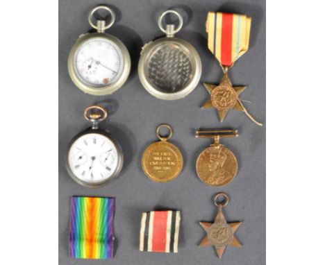 A collection of assorted WWI First and WWII Second World War medals and pocket watches to include; WWI Victory Medal for one 