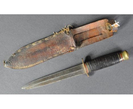 A WWI First World War period Taylor of Sheffield made 'Witness' double edged fighting dagger. Maker's marks to blade, with br