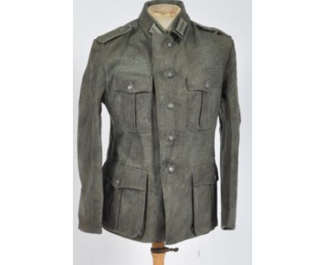 WWII Second World War Interest - a Third Reich Nazi German Army type uniform tunic / jacket. Complete example, with insignia 