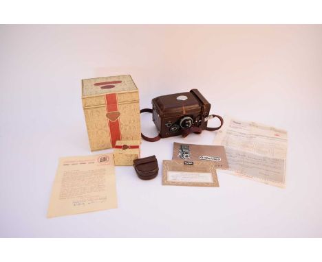 A Rolleiflex 3.5F camera, model 2, serial number 2234506, circa 1960, one of 11,500 made, with a leather case, box, original 