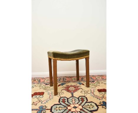 A 1953 Queen Elizabeth II coronation, limed oak stool, the concave shaped seat covered in a blue velvet with gold braiding, b