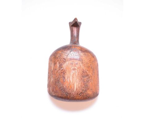 A Russian folk art carved wood ceremonial ladle or kvosh, probably mid to late 19th century carved with the inscription 'ънов