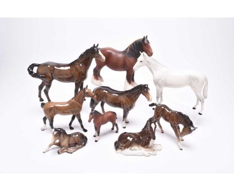 A group of Beswick horses, including a Hackney pony, model H261; a matt glaze Shire Horse, two Huntsmen on horses (grey, dark