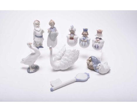 A group of Lladro porcelain, comprising Collector's Society items: a scroll with dove and feather, a bisque key dated 1999, a
