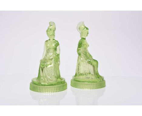 A pair of Victorian John Derbyshire pressed uranium green glass models of Britannia, anchor mark and patent diamond lozenge t
