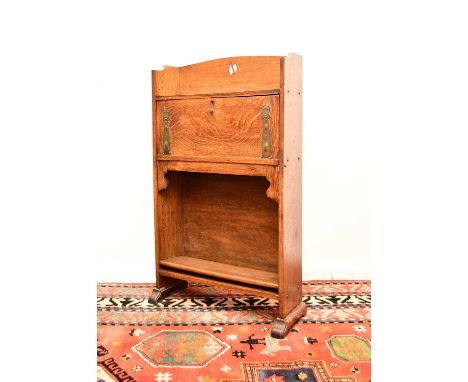 An Arts and Crafts style ash student's deskIn the manner of Shapland and Petter, the gallery top with pierced motif above a f