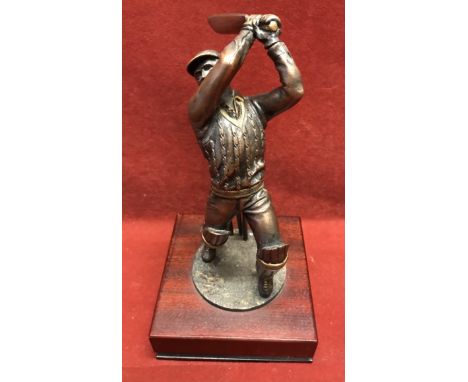 A Metal Sculpture of a batsman striking a ball at the wicket, would make a fine trophy. 7.5" plus plinth.