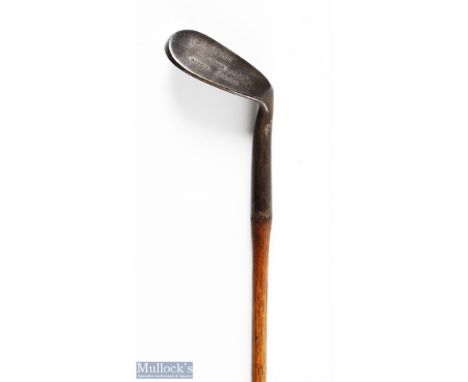 Bussey &amp; Co London mashie niblick showing the maker's arrow cleek mark and unusual face markings, fitted with a good full