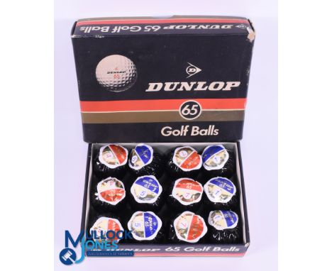 12x Dunlop 65 Wrapped Golf Balls - in the original black wrappers to incl 6x Red and Golf labels and 6x blue and gold Labels 