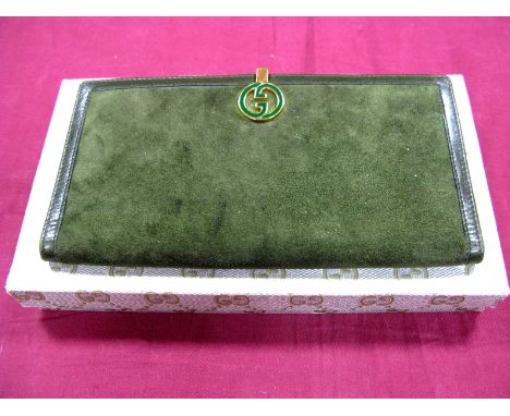 A Vintage Gucci Leather and Suede Purse, in olive green with green enamelled logo clasp, in original box.
