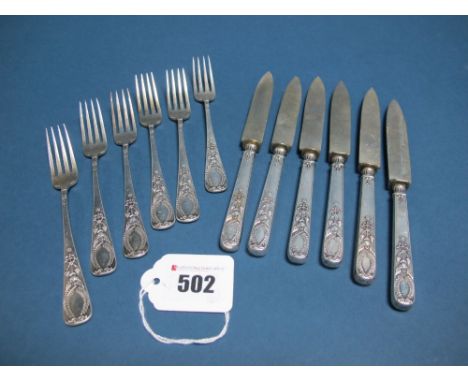 A Set of Six German Dessert/Fruit Knives and Forks, stamped crescent and crown mark and "800", the handles detailed in the Ru
