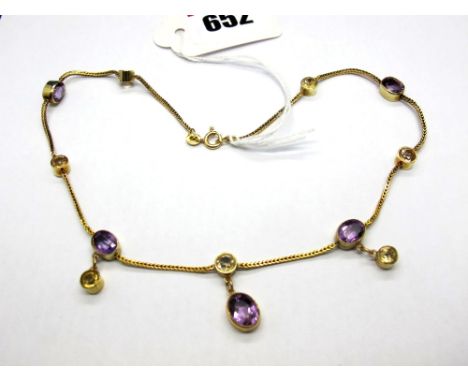 A Modern Necklace, oval and circular collet set, on uniform chain connection, suspending three drops, stamped "585". 