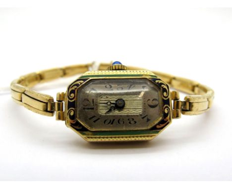 An 18ct Gold Cased Ladies Wristwatch, the rectangular dial with black Arabic numerals, within case highlighted in green and b