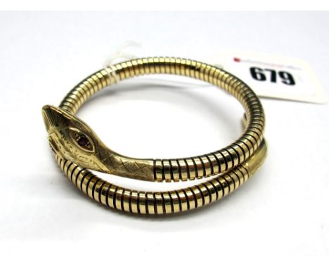 A 9ct Gold Serpent Bangle, (steel spring) with textured head and inset eyes. 