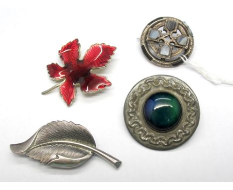 A Modernist Leaf Brooch, of stylised design, stamped "Beau B Sterling"; A Ruskin Style Ceramic Panel Inset Brooch, within tex