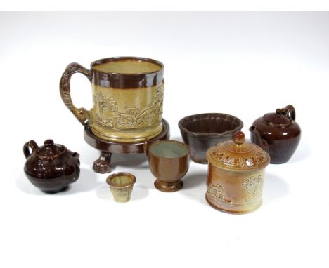 A Mid XIX Century Saltglazed Stoneware Mug, applied with a hunting scene, 12cm high; A Jelly Mould, Tobacco Jar and Teapot St