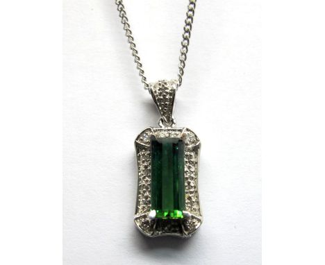 A Santa Rosa Tourmaline and Diamond Set Pendant, of Art Deco Style, elongated rectangular set to the centre, within diamond s