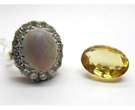 A Large 18ct Gold Opal and Diamond Cluster Ring, the (15x12mm) oval cabochon opal claw set, within border of brilliant cut di