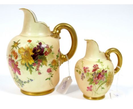 A Royal Worcester Porcelain Flat Handled Jug, the blush ivory grounds printed and painted with floral sprays, gilt border and