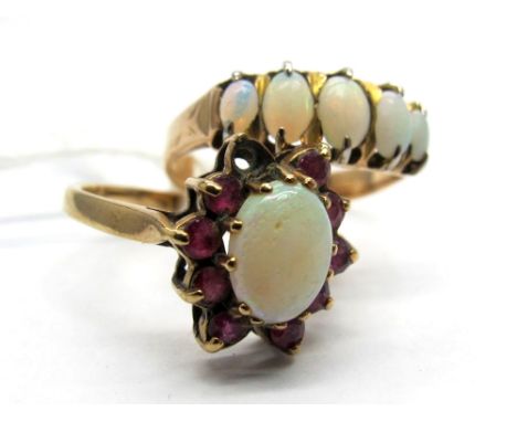 A Five Stone Opal Ring, oval cabochon claw set; Together with An Opal Set Cluster Ring, (one stone missing) indistinctly stam