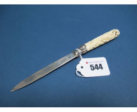 A Hallmarked Silver Letter Opener, Messrs Hutton, 1899, with Indian carved ivory handle, overall length 20.5cm. 