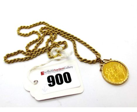 Victorian Sovereign, 1872 (young head) loose set within 9ct gold pendant mount, on a 9ct gold ropetwist chain. 