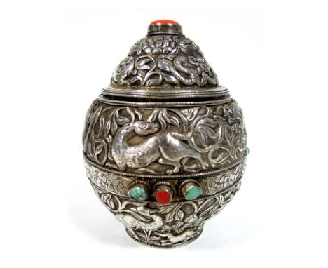 A Chinese Lidded Pot, (possibly resin lined) allover detailed in relief with sinuous dragons and animals, with collet set hig