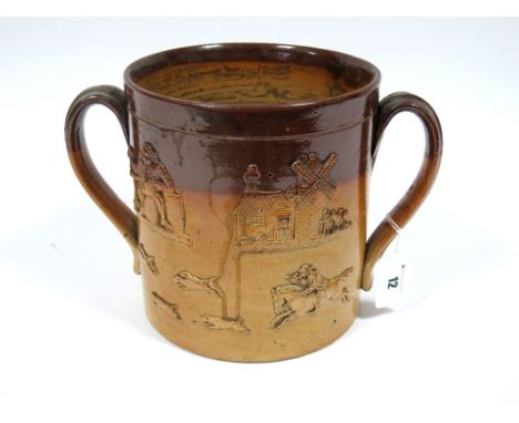 A Mid XIX Century Brampton Brown Salt Glazed Stoneware Two Handled Loving Cup, applied with a hunting scene and drinking figu