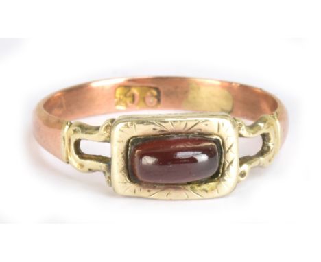 A Victorian 9ct yellow gold garnet dress ring, size L 1/2, approx 1.6g.Additional InformationThe ring appears to have been re