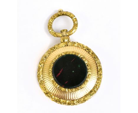 A 19th century yellow metal vinaigrette of circular form, with cast loop rotating handle and circular engine turned panel enc