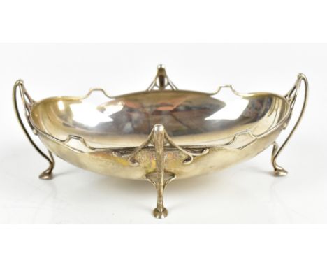 An Edwardian hallmarked silver oval bowl of Art Nouveau design with pierced framework and stepped feet, Birmingham 1906, leng