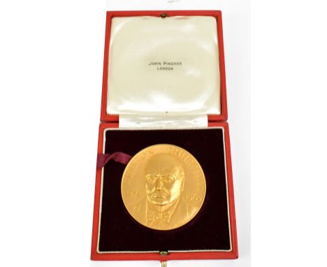 A cased 22ct yellow gold Sir Winston Churchill commemorative medallion, John Pinches, obverse full face portrait, reverse coa