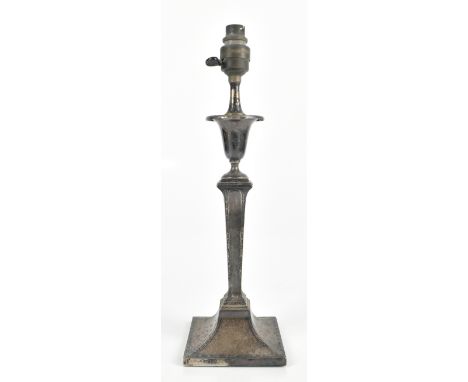 HAWKSWORTH, EYRE &amp; CO LTD; a hallmarked silver converted table lamp, with cast scrolling borders, marks rubbed, overall h