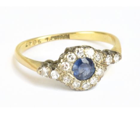 An 18ct yellow gold sapphire and diamond ring, size K, approx 2.2g.Additional InformationScratches to the sapphire and genera