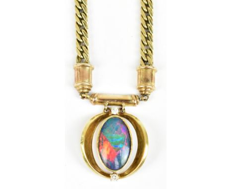 A 9ct yellow gold curb link necklace, with triplet opal flanked by two white stones, approx 25.9g.Additional InformationGener