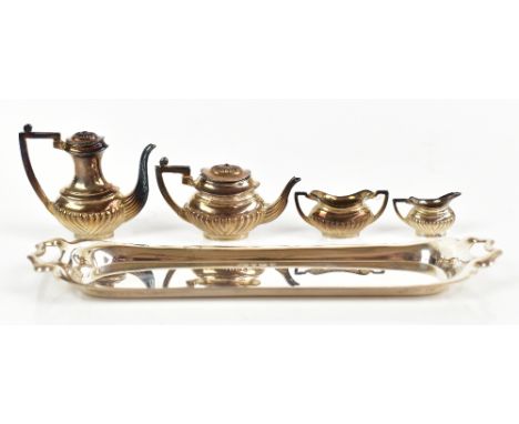 HAMPTON UTILITIES; an Elizabeth II hallmarked silver miniature/doll's house five piece tea service, comprising teapot, hot wa