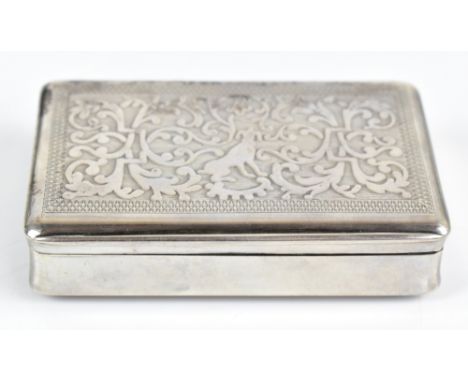 An Austrian silver snuff box of rectangular form, with engine turned and relief decorated cover, with gilt interior, possibly