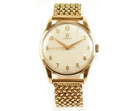 OMEGA; a gentleman's 9ct gold wristwatch, the circular dial with Arabic numerals, on 9ct gold mesh bracelet, overall length 1