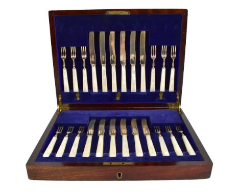 FRANK COBB &amp; CO LTD; a cased George V hallmarked silver and mother of pearl handled twelve setting fruit/dessert set comp