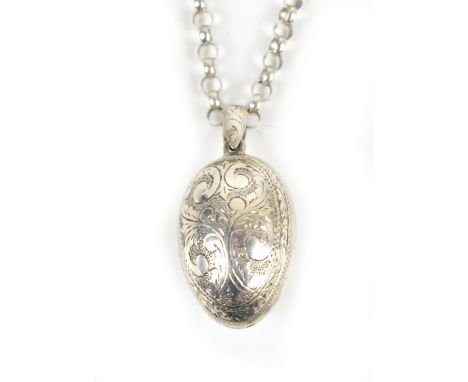 A silver chain suspending a white metal egg shaped pendant, length of chain approx 68cm, combined approx 0.85ozt/26.7g.Additi