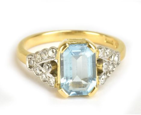 An 18ct yellow gold aquamarine and diamond ring, size K, approx 3.9g.Additional InformationThe aquamarine measures 8.9 x 6.3 