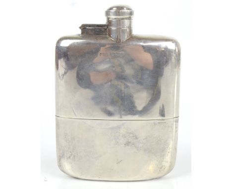 JAMES DIXON &amp; SONS; an early 20th century hallmarked silver hip flask of curved form with screw cap and detachable lower 