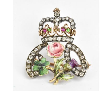 A rare yellow metal diamond and enamel decorated brooch made to commemorate the coronation of Edward VII in 1902, with open w