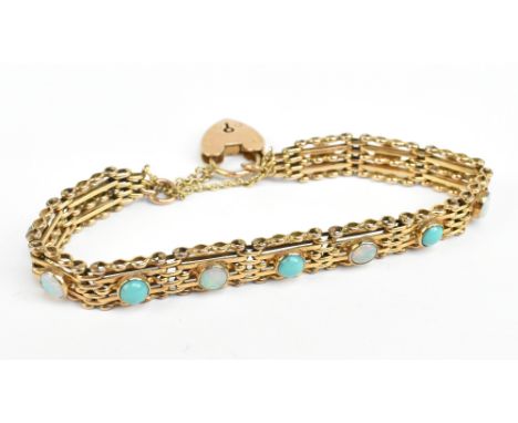 A 9ct yellow gold turquoise and opal set gate link bracelet with padlock clasp, the main panel set with six turquoise cabocho