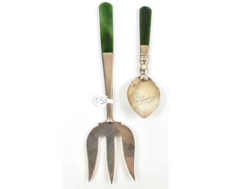 JAMES SWANN &amp; SONS; a George V hallmarked silver nephrite and nephrite handled bread fork, Birmingham 1926, length 18cm, 